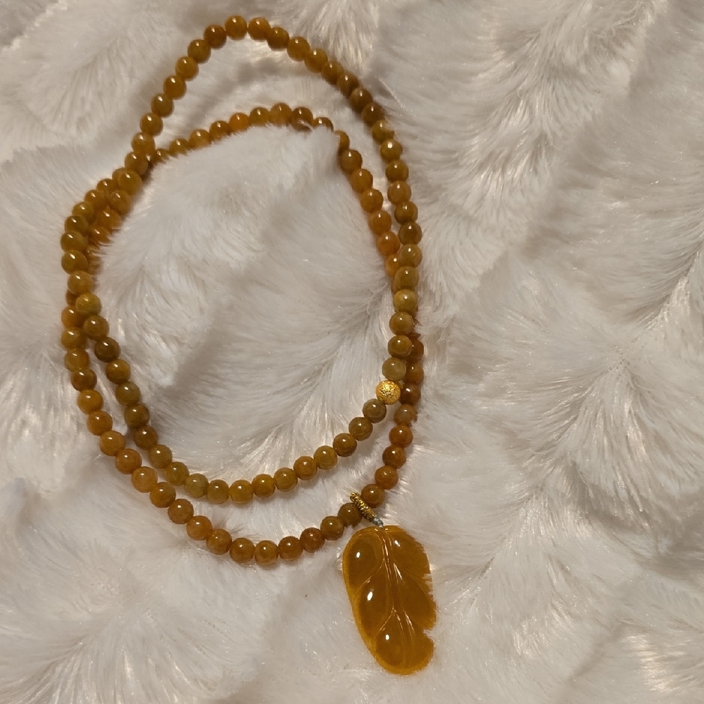 Elegant Gold Beaded Necklace with Leaf Pendant
